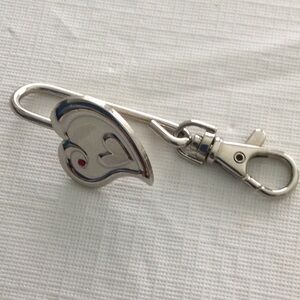 Woman’s Hook or key chain by Alex.Inc.Color sliver a Heart with in a Heart NWOT